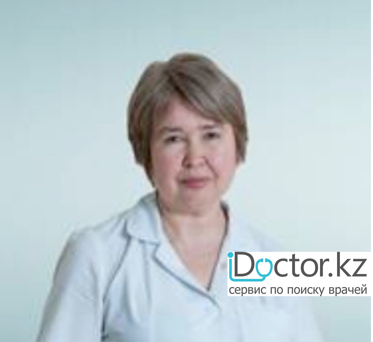 На фотографии изображён Офтальмолог (көз дәрігері) Макашева Елена Таксеновна