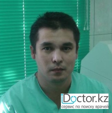 На фотографии изображён Абишев Руслан Серикович