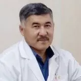 На фотографии изображён Балалар ортопеды Журтубаев Талгат Нагайбаевич