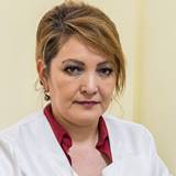 Суретте ЛОР (отоларинголог) Кебекбаева Жанар Кировна