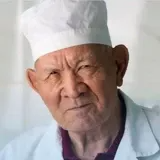 На фотографии изображён  Абдуллаев Кенесбай Пиржанович