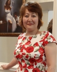 Суретте  Асельжан Каримова Куандыковна