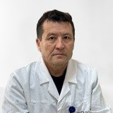 На фотографии изображён Балалар ортопеды Толеуханов Бейбут Омаргазинович