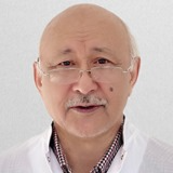 На фотографии изображён Флеболог Беспаев Абдимажит Тасибекович