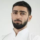 На фотографии изображён Флеболог Мемишев Тайфур Закирович