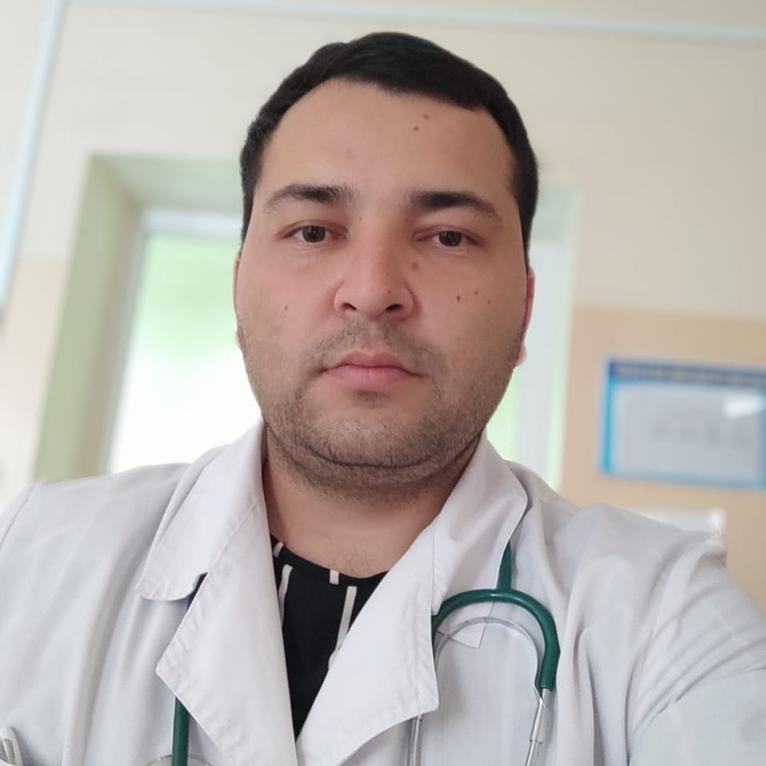 На фотографии изображён Педиатр Абидов Исламбек Юлдашбекович